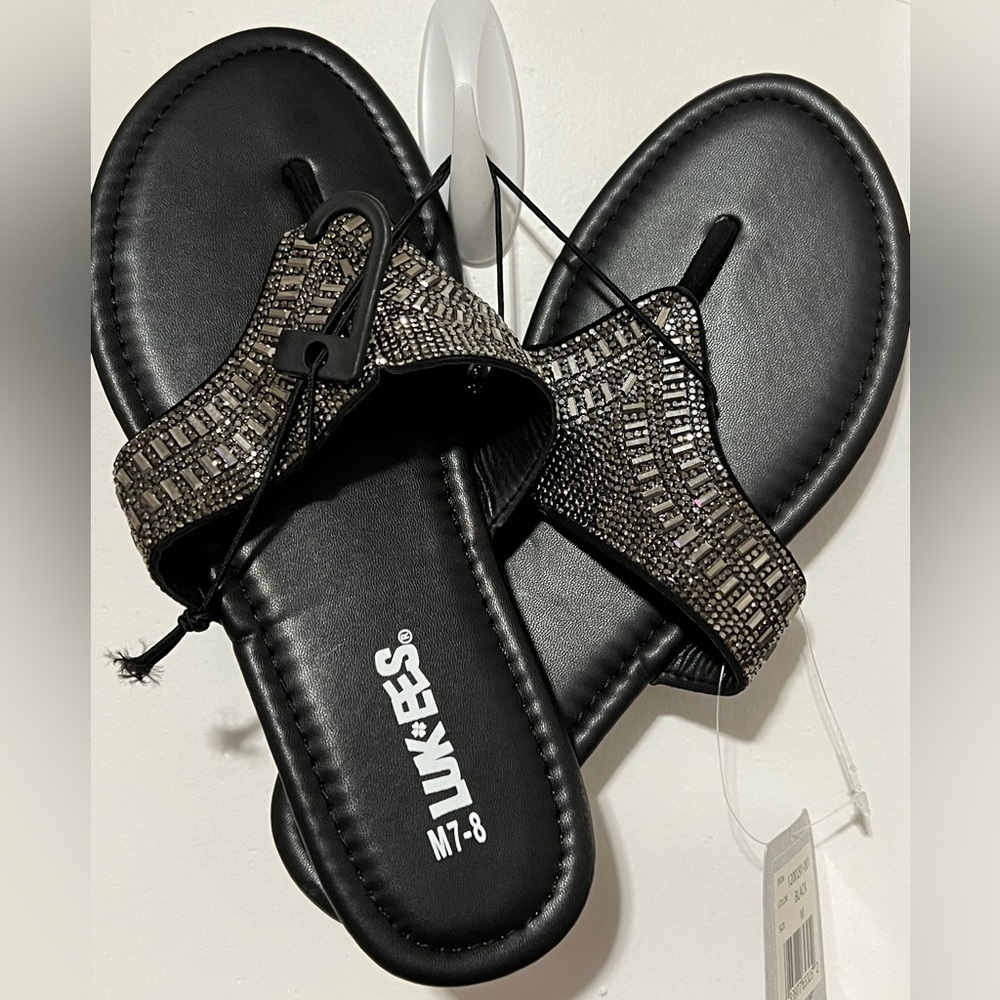 Muk Luks size 7/8. Woman’s slip on sandals with rhinestones. Very pretty